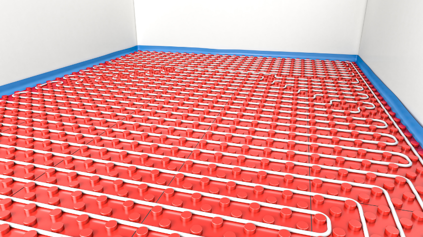 Installation de plancher chauffant hydraulique avec tubes de chauffage intégrés dans une dalle isolée